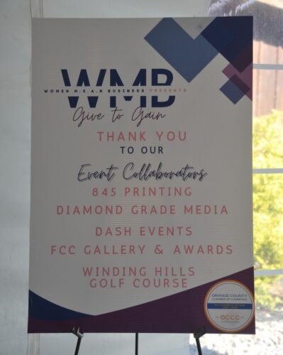 Banner congratulating event collaborators for a Women Mean Business event, listing 845 Printing, Diamond Grade Media, Dash Events, FCC Gallery & Awards, Winding Hills Golf Course and a round sponsor seal at bottom right.