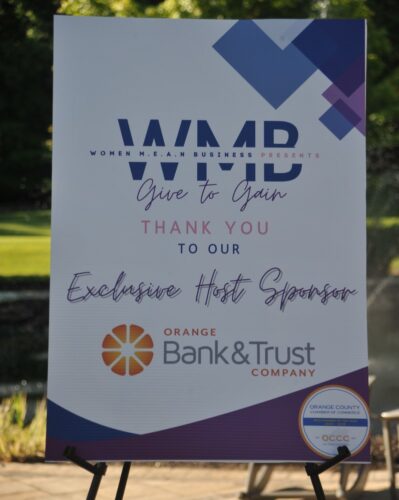 Event banner for 'Give to Gain' by WMBD with Orange Bank & Trust as sponsor.